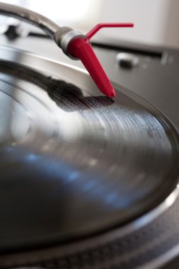 record player with a needle touching