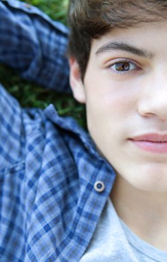 portrait of an attractive teenager student boy