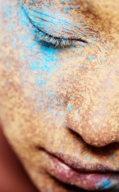 girl face with makeup powder pigment and glitter