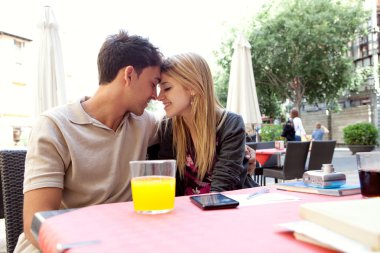 couple being romantic and holding their foreheads together
