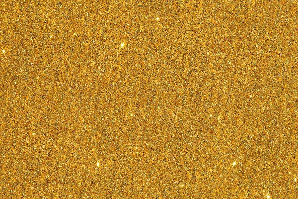 Background of a vivid bright gold glitter — 图库照片