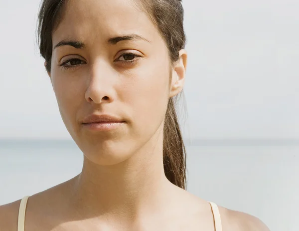 Beautiful teenager woman on a beach — Stok fotoğraf