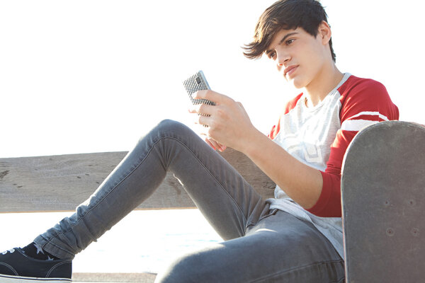 boy using a smartphone for networking