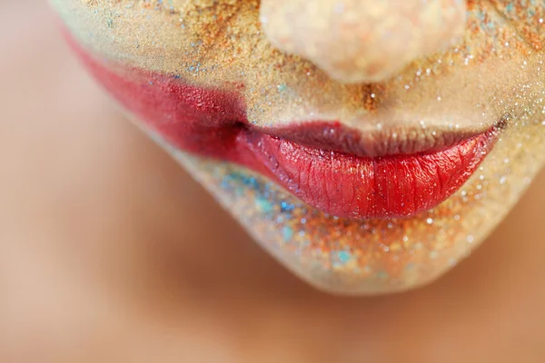 Girl face with makeup powder pigment and glitter — Stockfoto