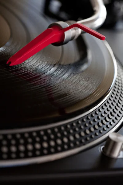 Record player with a needle touching — Stok fotoğraf