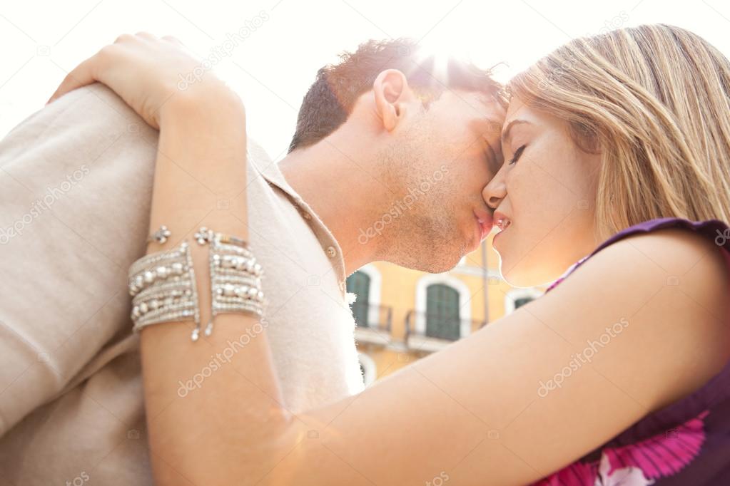 couple being romantic and passionately kissing