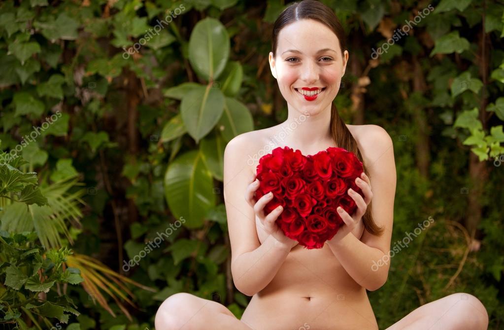 Nude girl holding 12