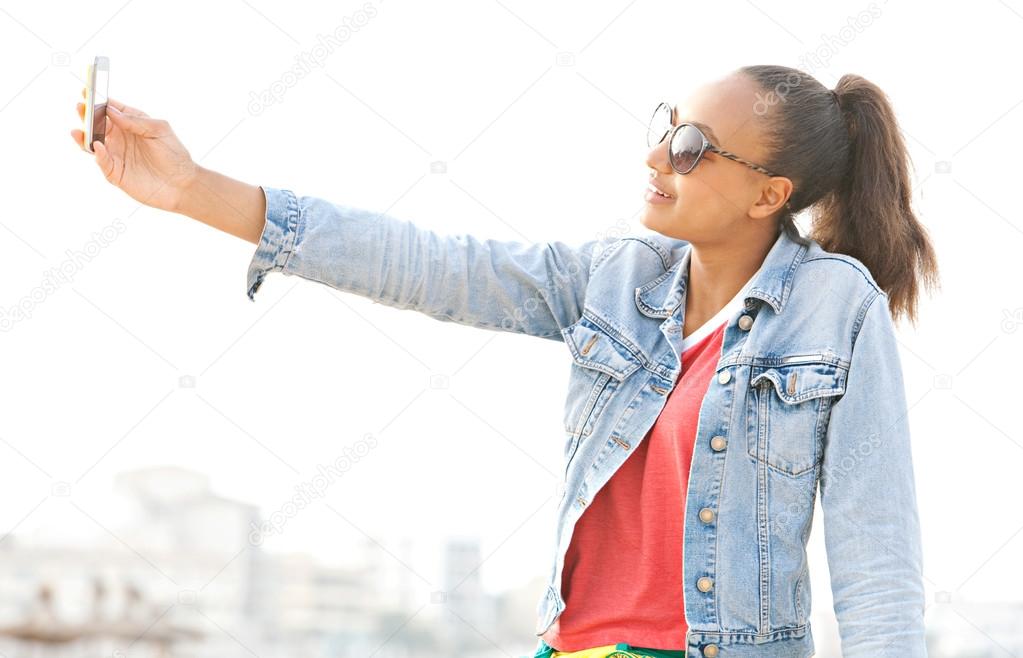 teenager girl take a selfie portrait of herself
