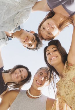 friends looking down at the camera