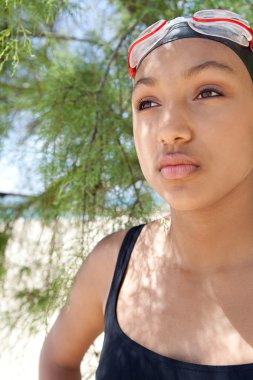 young swimmer woman looking thoughtful