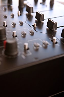 DJ mixing deck wtih buttons and control slides