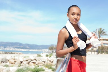 young woman relaxing with a towel
