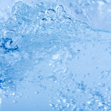 background detail of blue water liquid in motion