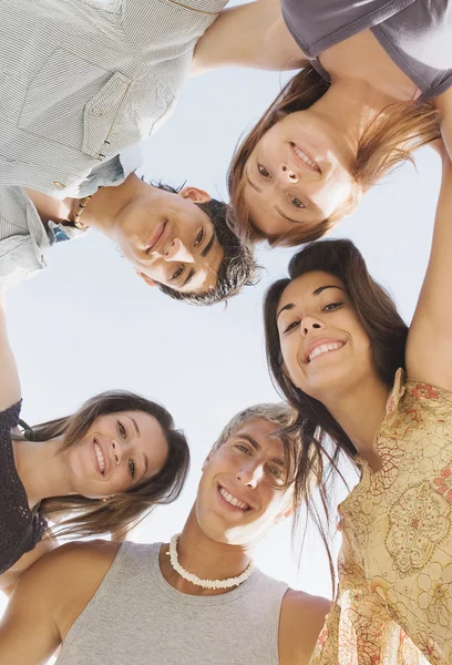 Friends looking down at the camera — Stock Photo, Image