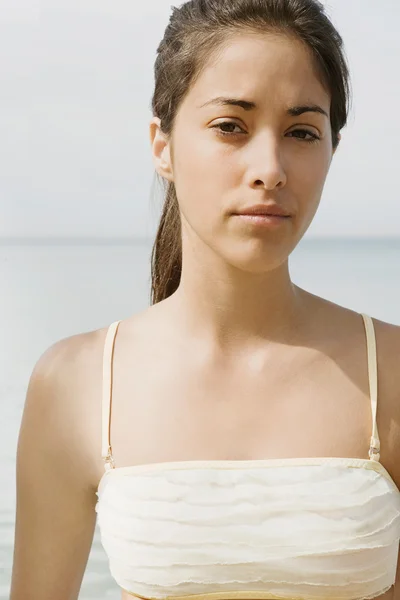 Beautiful teenager woman on a beach — ストック写真