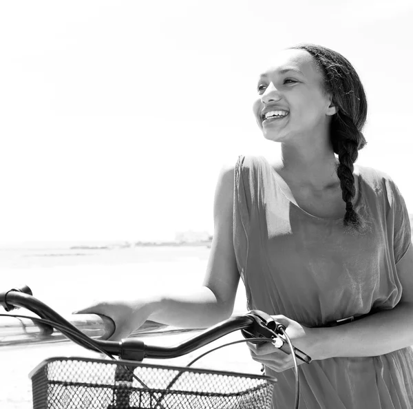 Teenager girl with her bicycle — Stok fotoğraf