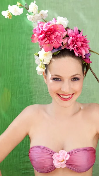 Woman wearing a spring flowers hair dress — ストック写真