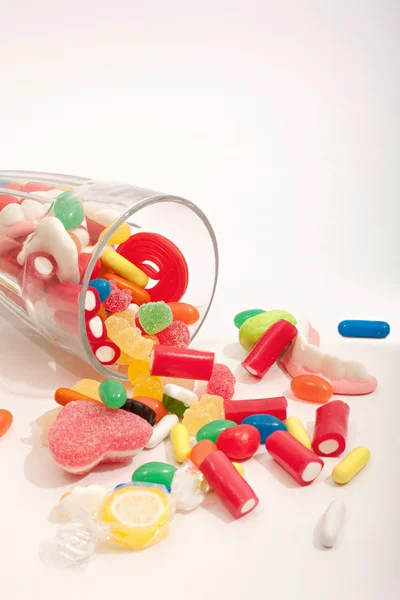 Glass jar container with candy sweets and jelly beans - Stok İmaj