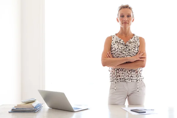 Business woman being confident and working from home Stock Photo