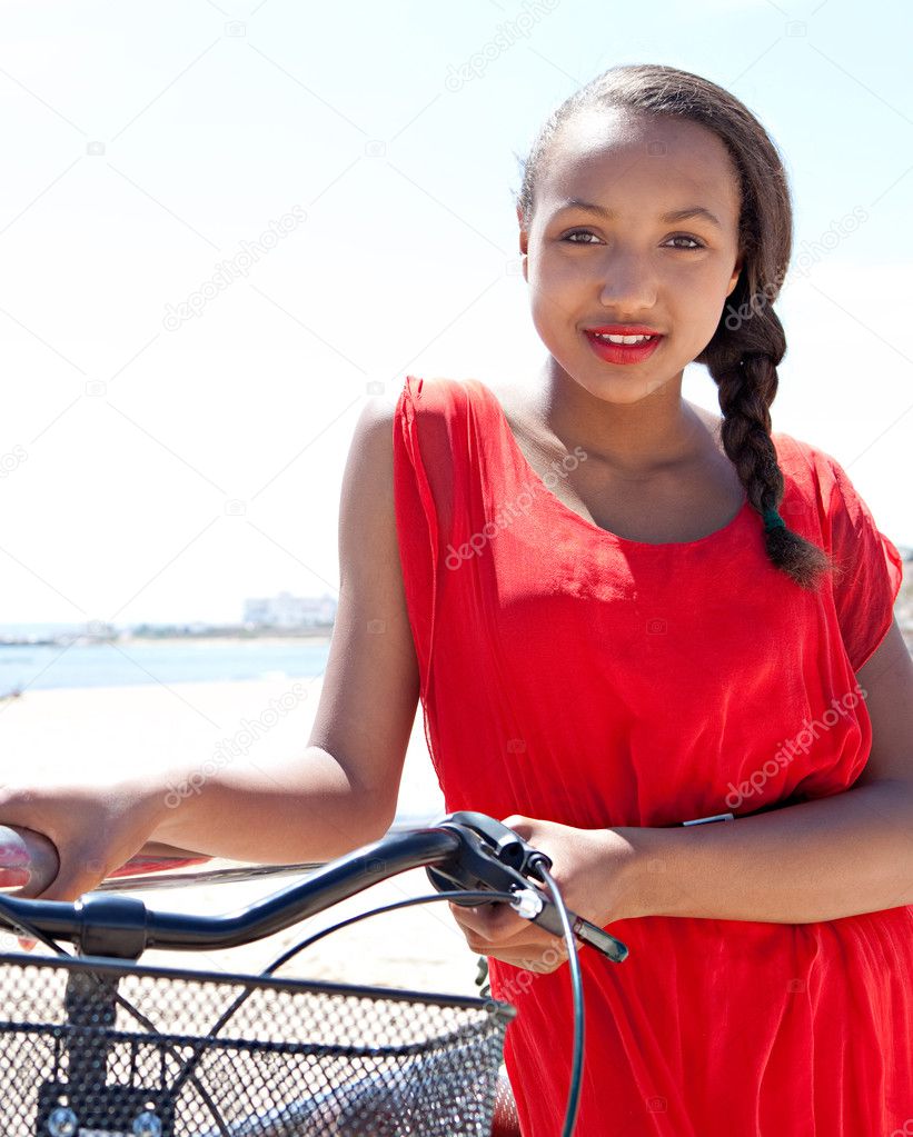teenager girl with her bicycle