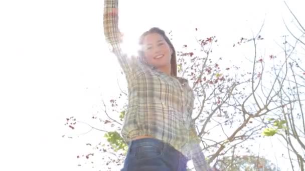 Woman dancing around on a sunny day — Stock Video