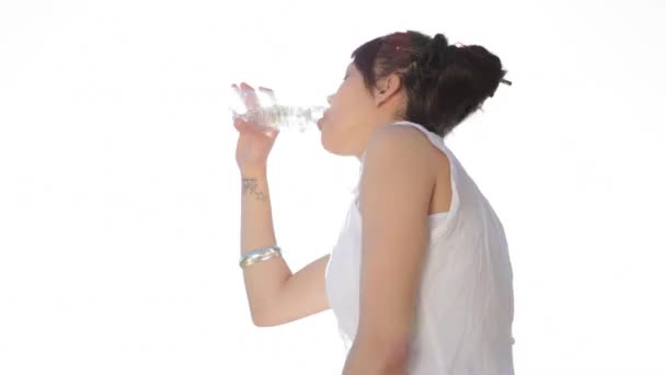 Woman drinking water from a bottle — Stock Video