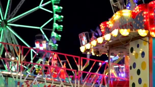 Colorful ride in theme park at night — Stock Video