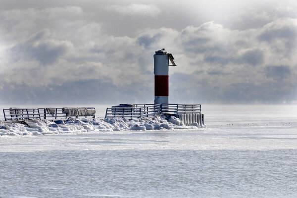 Boat navigation equipment on lake Michigan covered in ice