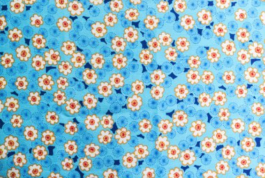 Çiçek desen kumaş arka plan üzerinde