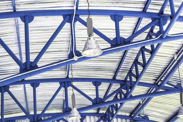 Lamp and blue ceiling structure — Stock Photo, Image