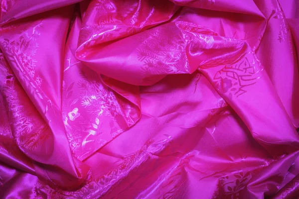 Różowy tkanina tło — Zdjęcie stockowe