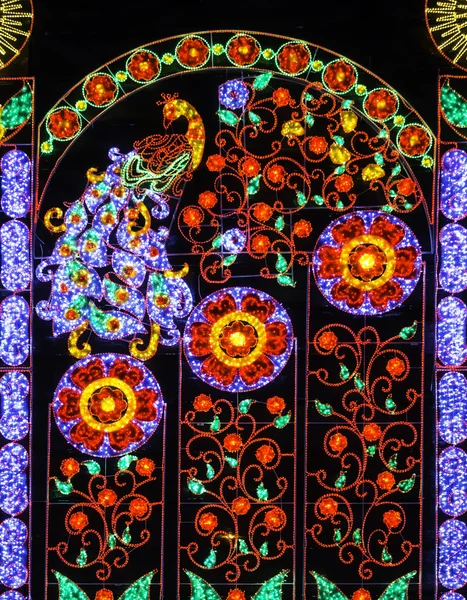 Pavão e flores decoração de luzes — Fotografia de Stock