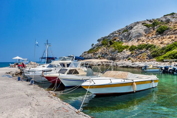 Old traditional beautiful fishing boats by the sea in Rhodes island in Greece — Stock Photo, Image