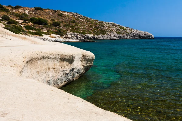 Kolymbia beach with the rocky coast in Greece. — Stock Photo, Image