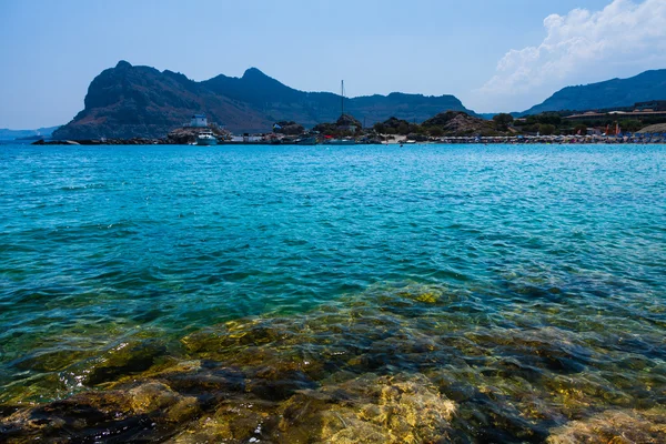 Kolymbia beach with the rocky coast in Greece. — Stock Photo, Image