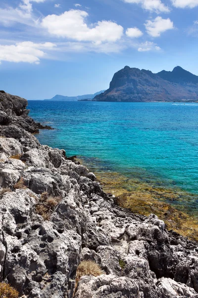 Kolymbia beach with the rocky coast in Greece. — Stock Photo, Image