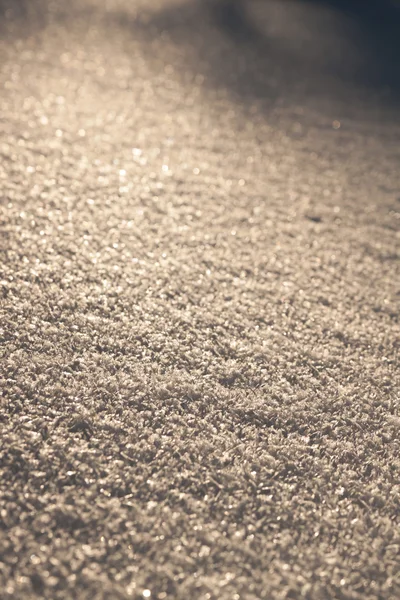 Wintertextur - Detailschnee mit Sonne und Kristallen — Stockfoto