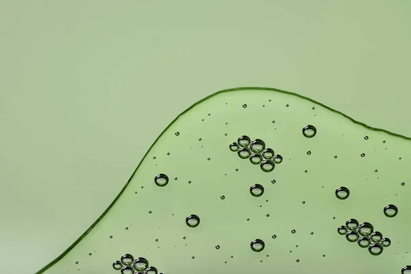 Sıvı Serum Jel Kabarcıkları Arka Plan Açık Yeşil Renkli Makro — Stok fotoğraf