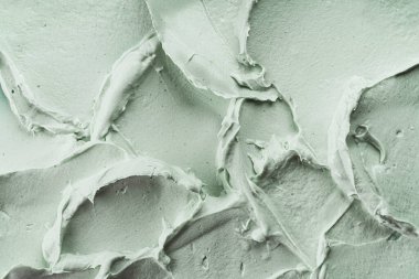 Yeşil kozmetik kil maske dokusu yakın çekim. Soyut arkaplan, seçici odak.