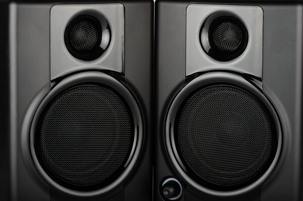 Studio Monitors closeup with two speakers and screens
