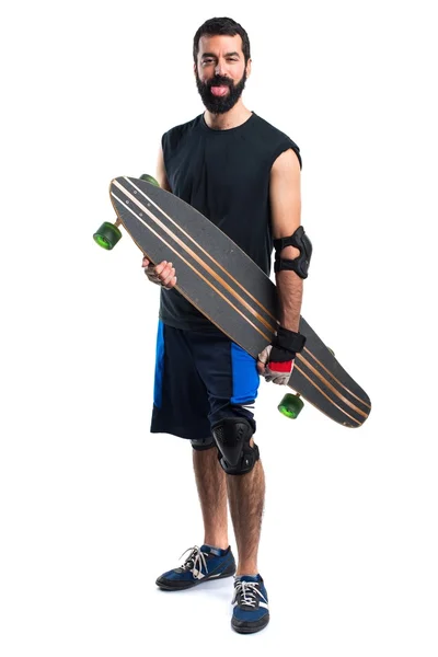 Hombre patinador con longboard —  Fotos de Stock