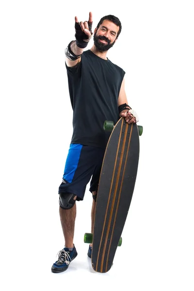 Hombre patinador con longboard — Foto de Stock