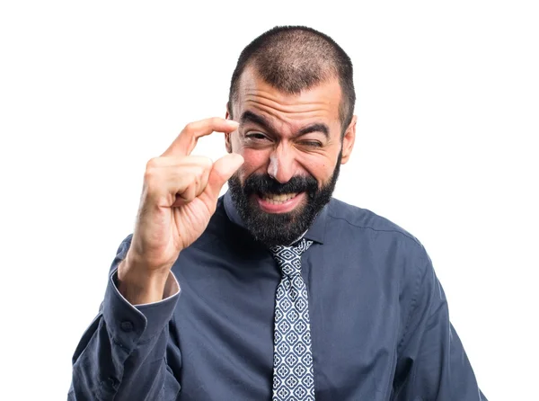 Homem fazendo pequeno sinal — Fotografia de Stock