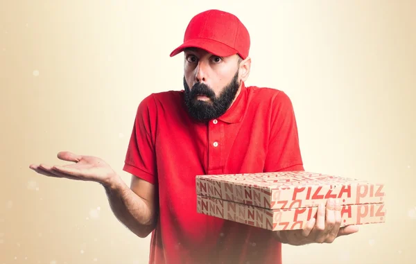 Entrega de pizza homem fazendo gesto sem importância — Fotografia de Stock