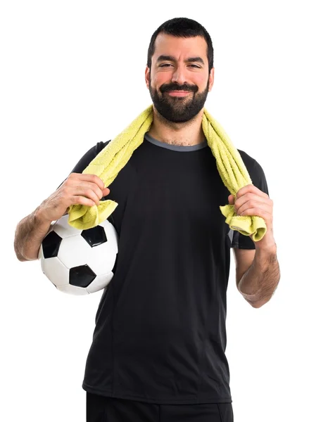 Voetballer met handdoek — Stockfoto