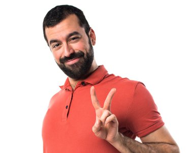 Zafer jest yapan yakışıklı erkek