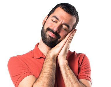 Uyku jest yapan yakışıklı erkek