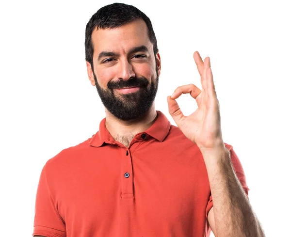 Yakışıklı adam ok işareti yapmak — Stok fotoğraf