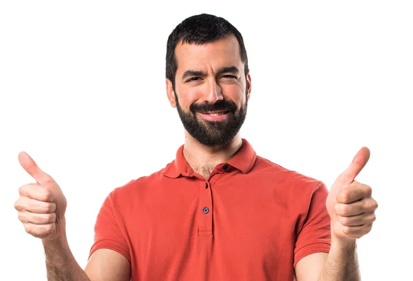 Hombre guapo con el pulgar hacia arriba —  Fotos de Stock