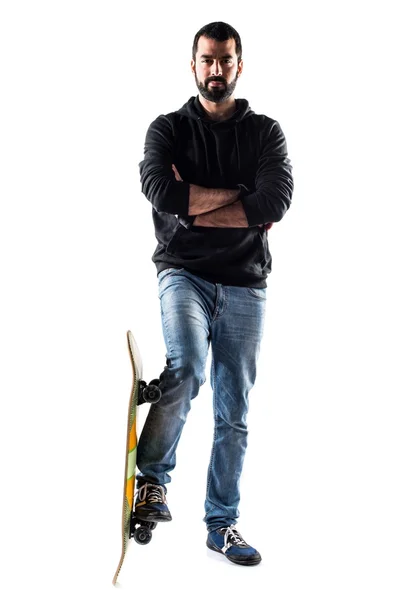 Skater man with his arms crossed — Stock Photo, Image